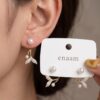 Graceful Fish Tail Pearl Stud Earrings