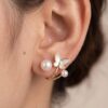 Earring_on_human_ear_2K_202607021440 Elegant Butterfly Pearl Stud Earrings
