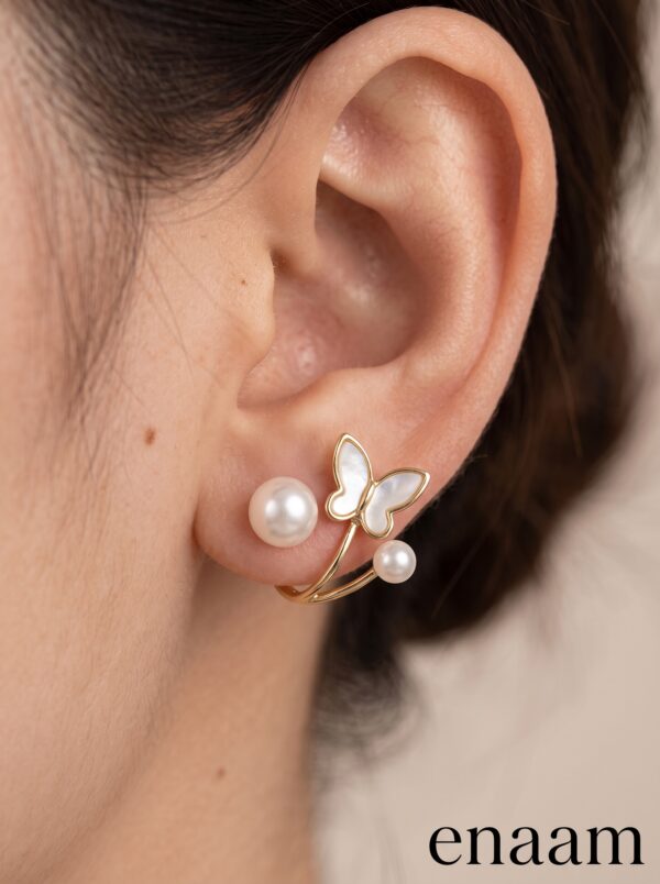 Earring_on_human_ear_2K_202607021440 Elegant Butterfly Pearl Stud Earrings