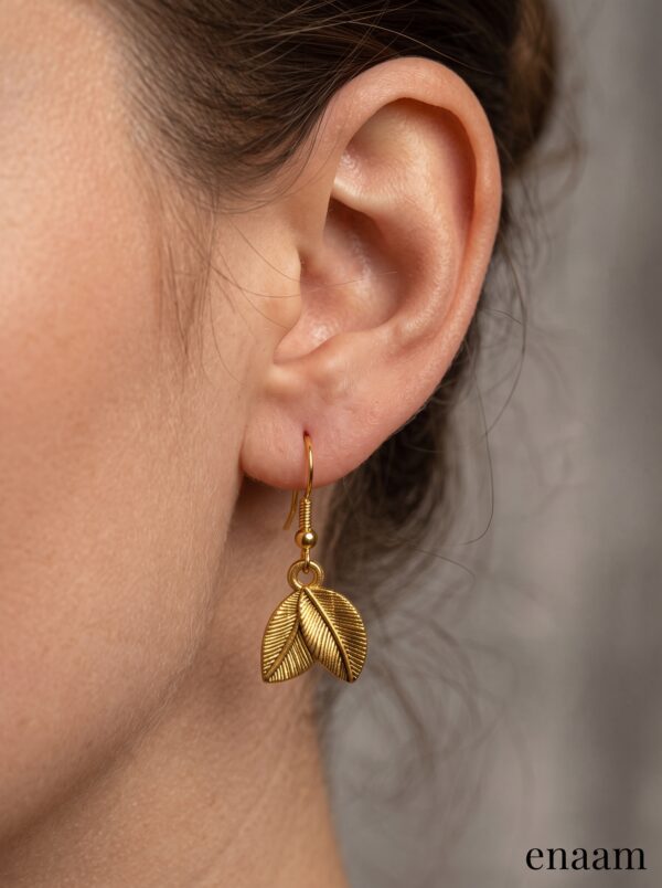 Earring_on_human_ear_2K_202607021515 Gold Plated Leaf Drop Jhumka Earrings