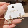 Graceful Fish Tail Pearl Stud Earrings