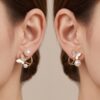 Jewelry_product_worn_on_ears_202607021445 Elegant Butterfly Pearl Stud Earrings